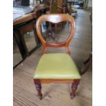A set of eight mid Victorian balloon back dining chairs, with drop in seats on turned tapering