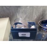 A heavy silver napkin ring, boxed