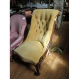 A mid Victorian rosewood nursing chair, the scroll top button upholstered back on moulded cabriole