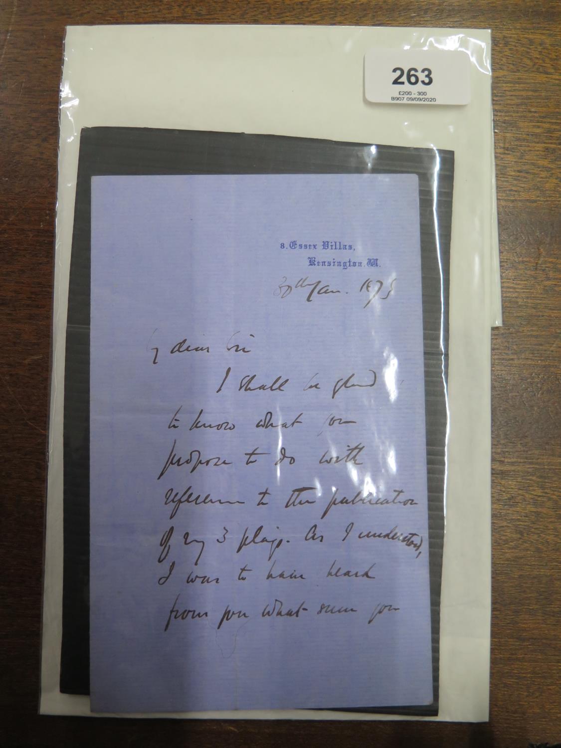 A handwritten and signed letter by W.S. Gilbert on folded blue paper addressed from 8 Essex