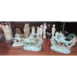 A collection of Oriental carved soapstone and resin figures including elders and horses, and a