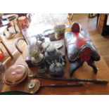 A blacked metal oil lamp, a brass oil lamp, various copperwares, a silver plated dressing table set,