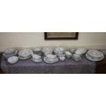 A Royal Doulton Yorktown pattern part dinner service, including oval meat plate, tureens and sauce