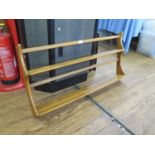 An Ercol elm two tier plate rack, 96 cm wide, 50 cm high, (no label)