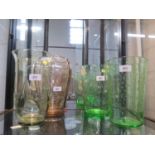 A matched pair of Whitefriars glass air bubble vases, in bottle green, 23.5 cm high and two other