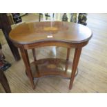 An Edwardian mahogany and satinwood crossbanded kidney-shaped two tier whatnot, the top inlaid