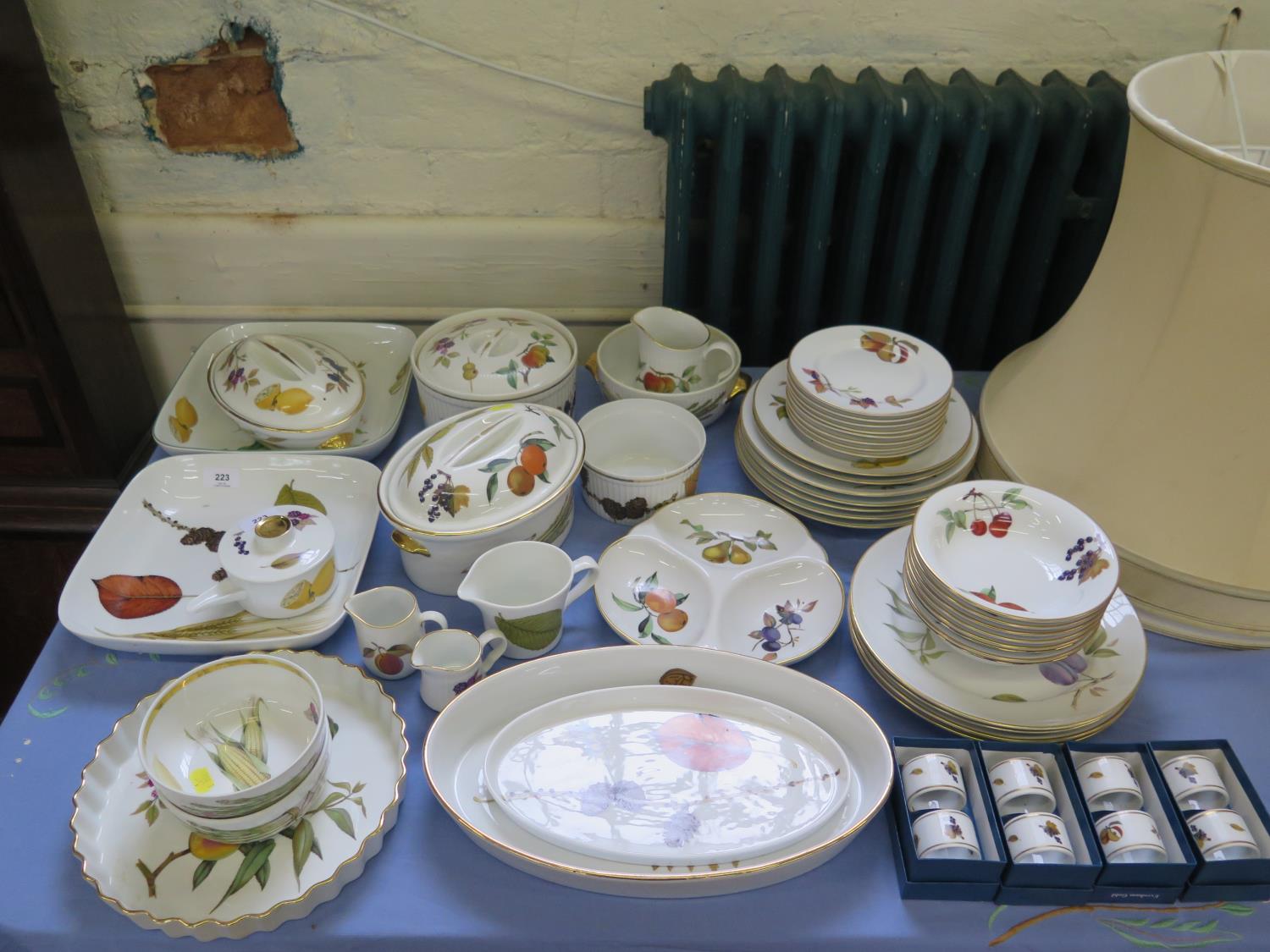 Royal Worcester Evesham pattern table wares, including serving dishes, plates and napkin rings