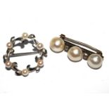 A small pearl and diamond brooch and another