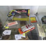 A Corgi silver 270 James Bond Aston Martin DB5 with instructions in paper packet, spare figure,