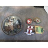 A Crufts Show Judges enamel lapel badge, another three lapel badges and an enamel bowl by Wilson &