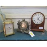 A yew wood veneered quartz table clock by Comitti of London and two other table clocks