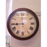 A mahogany circular wall clock, the painted dial with Roman numerals and single train fusee movement