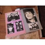 Bound photographs and postcards of The Beatles, in two albums, two albums of Errol Flynn 10 x 8 inch