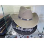 A Broner cowboy hat, a polyester cowboy hat, and a Henschel hat in the style for a Union officer,