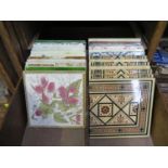 A set of seven Mintons fireplace tiles, 15 cm square and seventeen other late Victorian and