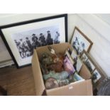 Various John Wayne memorabilia, including photographs, figures, plates and a clock