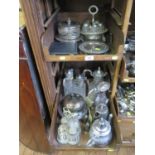 Two trays of silver plate, including condiment sets and claret jugs