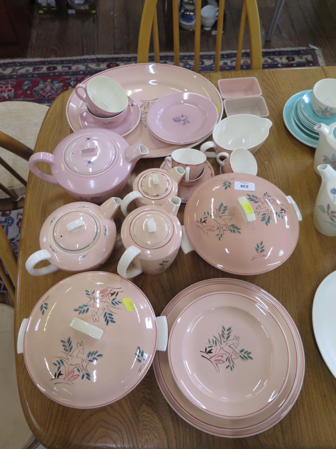 Poole Pottery dinner and tea wares in pink, including Leaping deer pattern, and others