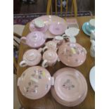 Poole Pottery dinner and tea wares in pink, including Leaping deer pattern, and others