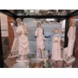 Two Lladro figures of a doctor, 36 cm high, another of an obstetrician, 36 cm high (with box),