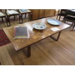 A rosewood parquetry coffee table by France & Sons, on a trestle base, labelled and numbered