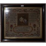 A mid Victorian woolwork sampler, by Elizabeth Frankland aged 11 years November 12 1875, depicting a