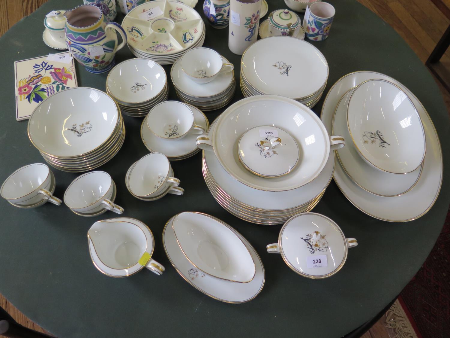 A Noritake Diana pattern dinner service, including sauce boat and serving dishes, 56 pieces