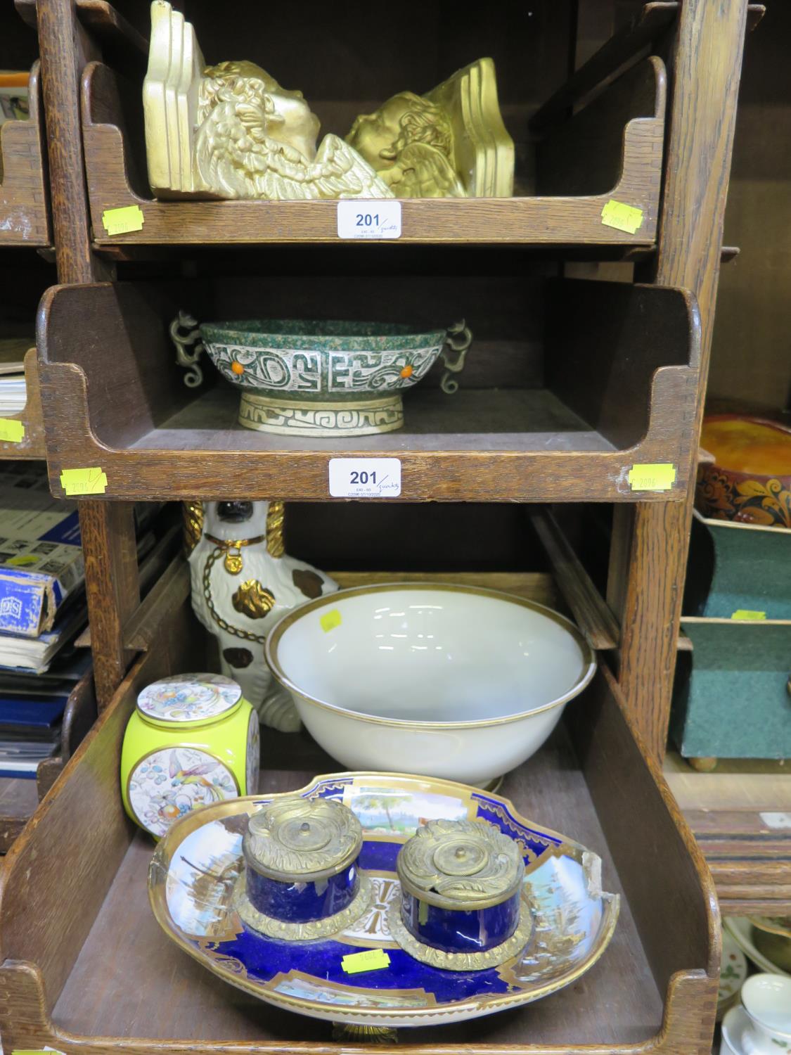 A 19th century Sevres ink standish, the two inkwells on an oval stand with panels of harbour