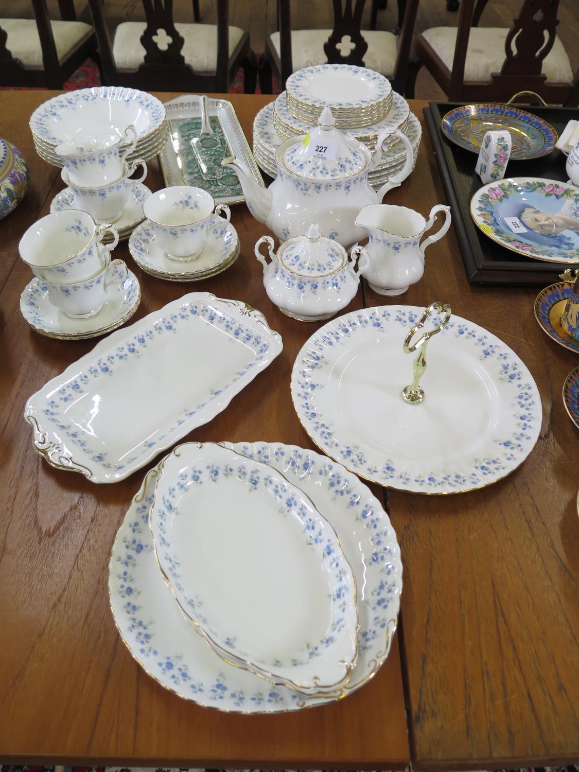 A Royal Albert Memory Lane pattern tea and dinner service, including tea pot, cake stand and plates,