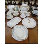 A Royal Albert Memory Lane pattern tea and dinner service, including tea pot, cake stand and plates,