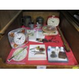 An Arts and Crafts style clock 11cm, retro 1950s clock, European beer mats, 'D' printing block,