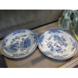 A set of four Chinese blue and white porcelain plates, with floral decoration, unmarked