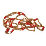 A coral necklace set with 18 carat gold tubes