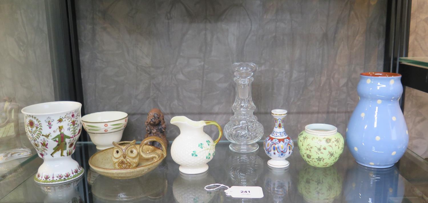 A Belleek Shamrock pattern milk jug, 9cm, stoneware owl candlestick, Kurt Hammer goblet and other