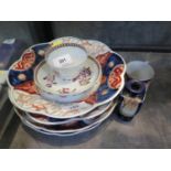 An English porcelain tea bowl and saucer, with rose decoration, cup 7.5 cm diameter, two pairs of