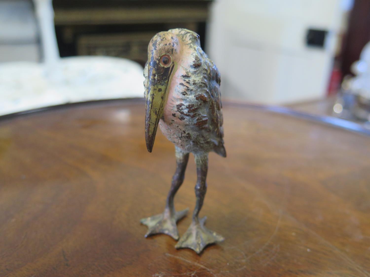 A cold painted bronze figure of a stork, unmarked, 9 cm high