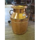 A copper milk churn, stamped J. Hanson & Sons Ltd. Liverpool, the cap stamped Trowbridge, 50 cm high