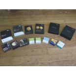Sixteen cased silver proof commemorative coins issued by The Royal Mint, other cupro-nickel