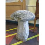A large staddle stone, 52 cm diameter, 67 cm high