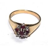 A ruby and cubic zirconia ring set in 9 carat gold