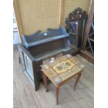 An oak hanging cabinet, with shelf over a pair of panelled doors, 60 cm wide, a fret carved wall