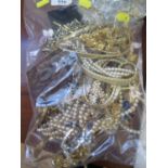 A large bag of costume jewellery