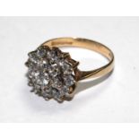 A 9 carat gold ring set with faux diamonds