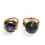 Two gem set rings in gold colour metal