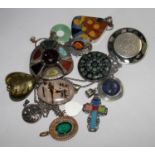 A bag of fourteen various pendants, brooches, etc