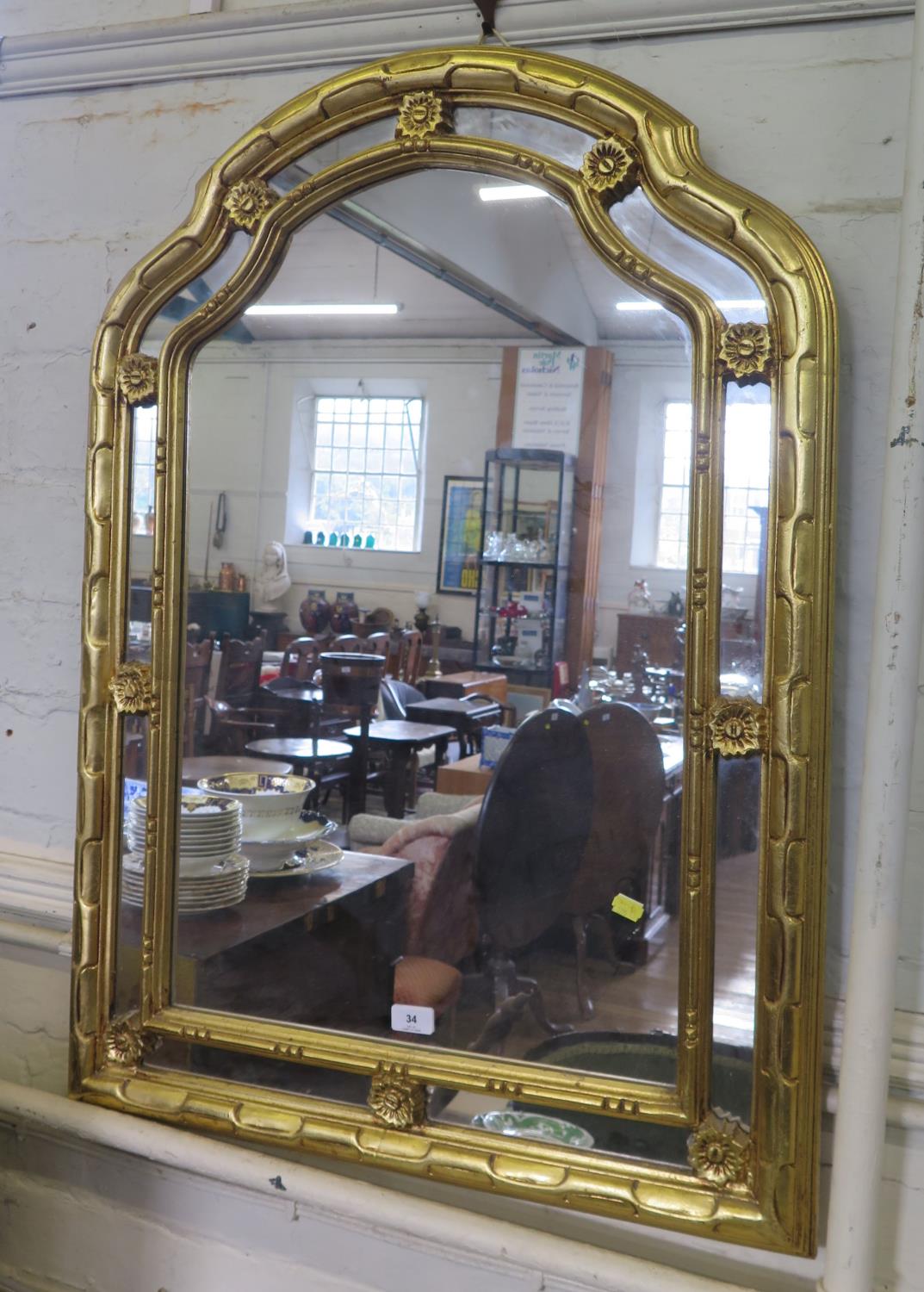 An oval giltwood wall mirror, with panelled border, 92 cm x 72 cm, and a shaped giltwood mirror - Image 2 of 2