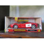 A Maisto 1.14 scale model La Ferrari Moto Sound car with box and papers