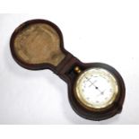 A pocket barometer in a leather case by Short & Mason Ltd, London