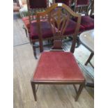 A set of six George III style shield back mahogany dining chairs, with pierced vase shape splats,