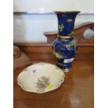 A Carlton Ware Chinese style powder blue and lustre vase, 21 cm high, and a continental dish